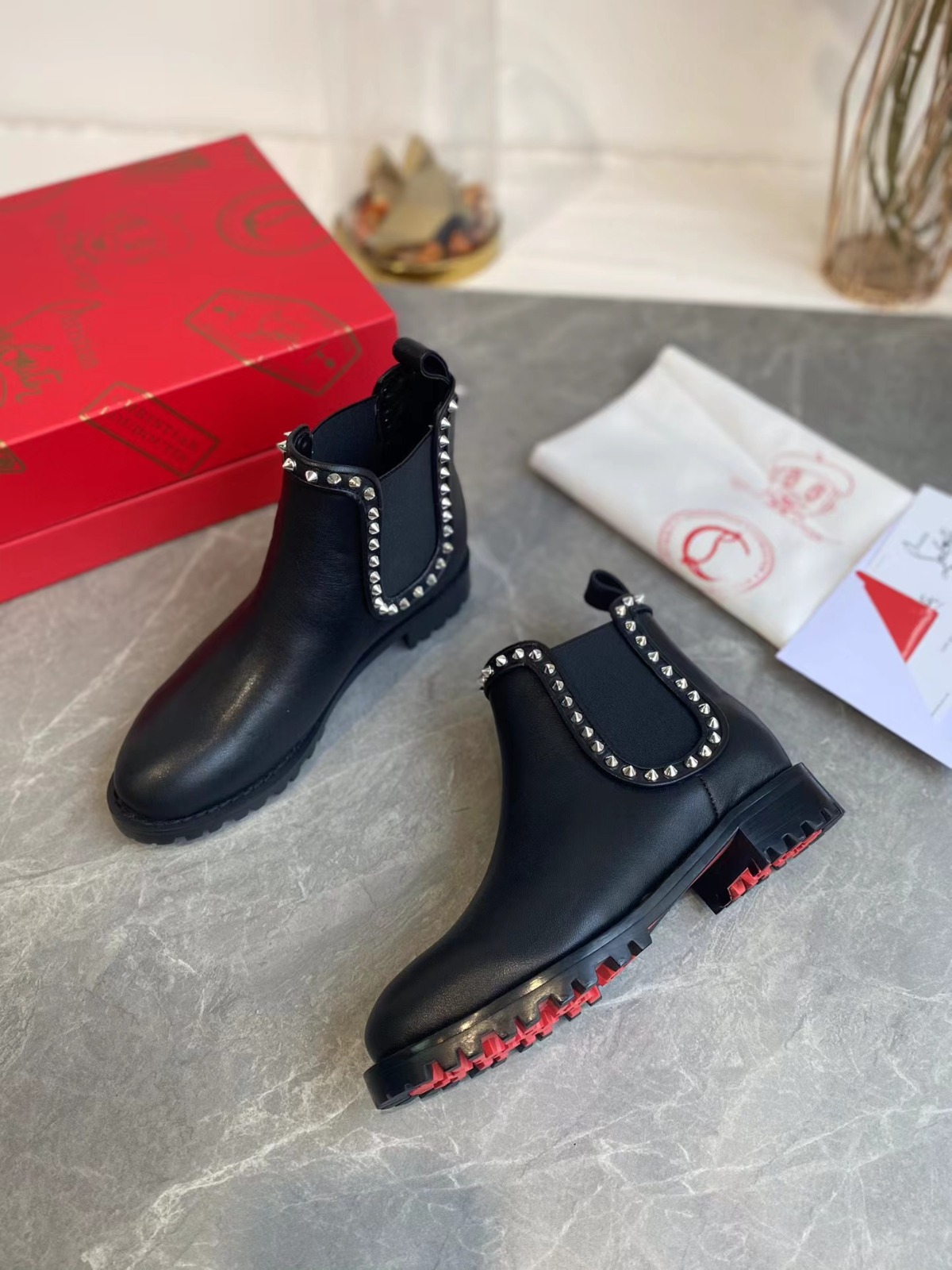 Christian Louboutin Spiked Ankle Boot - GlamGems Boutique